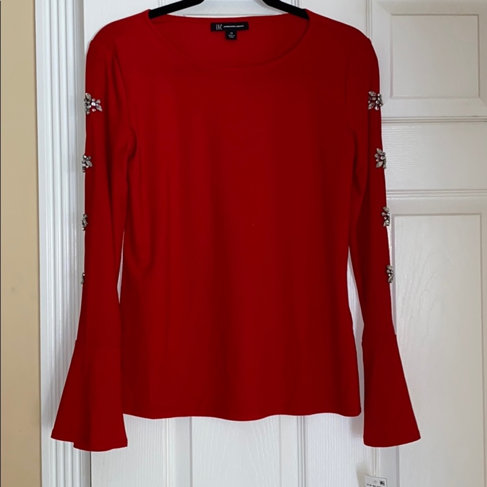 NEW INC Top